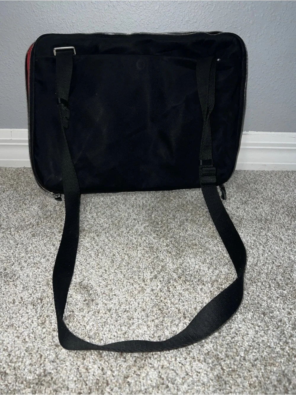 Knomo Black Nylon Messenger Bag with Red Accents